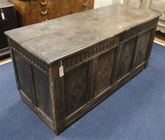 A late 17th century oak coffer. W.57cm